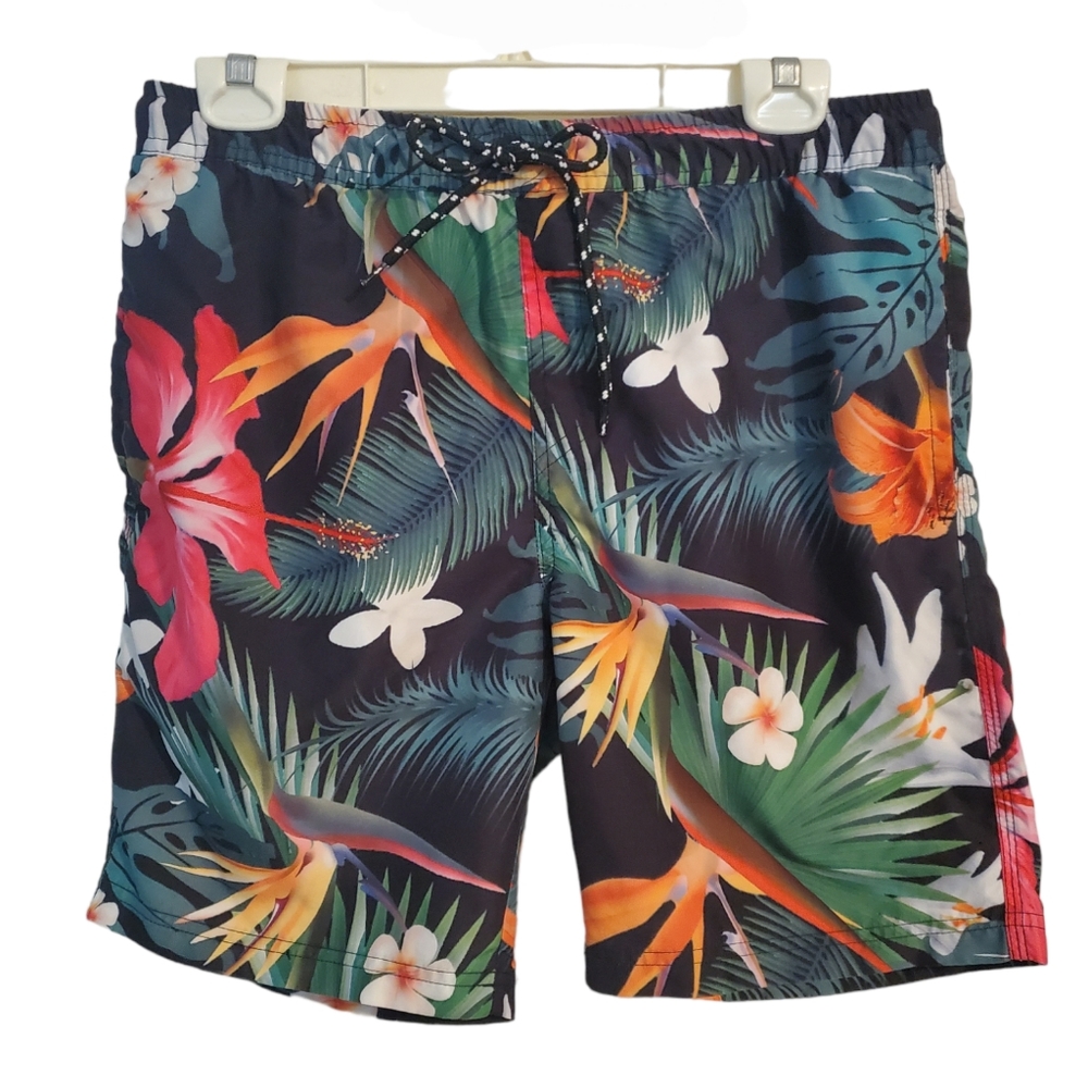 Boys tropical print swim trunks Has pockets Elastic waist Size Med